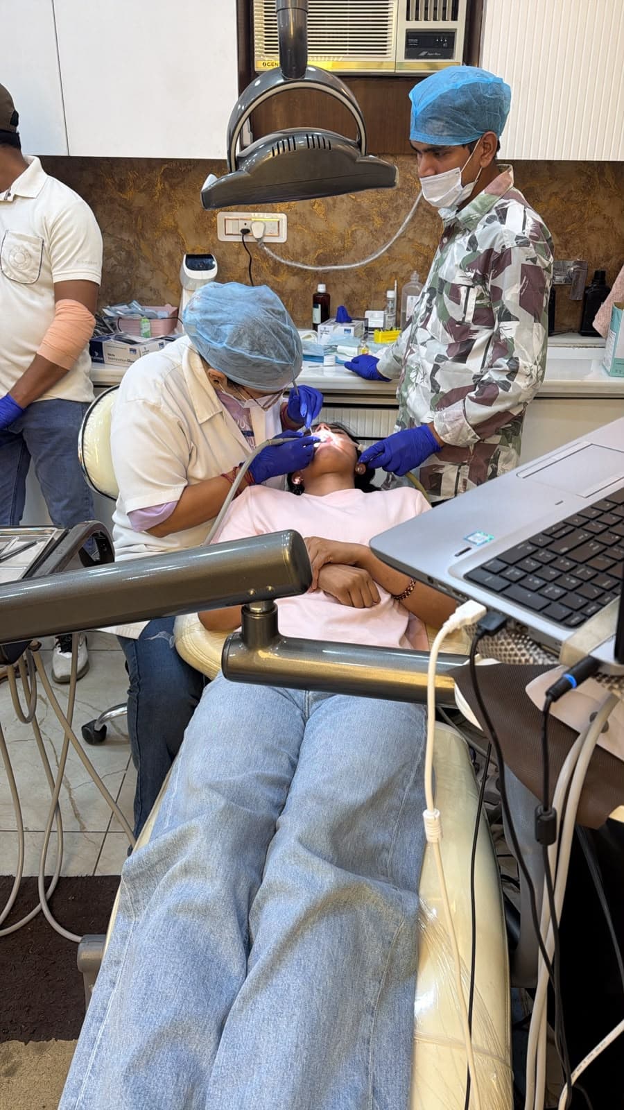 Specialist team conducting advanced dental restoration