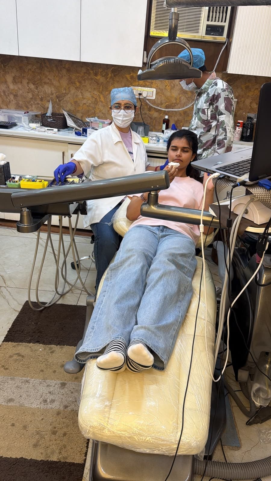 Specialist dental surgeon providing compassionate patient care